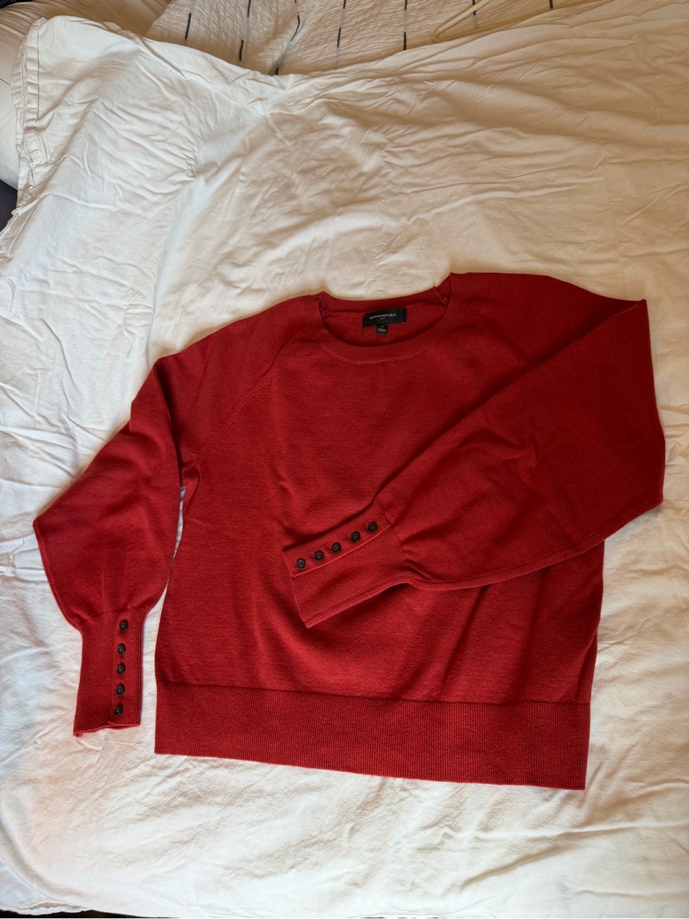 Women's dark orange Crewneck Sweater with Button Cuff Detail